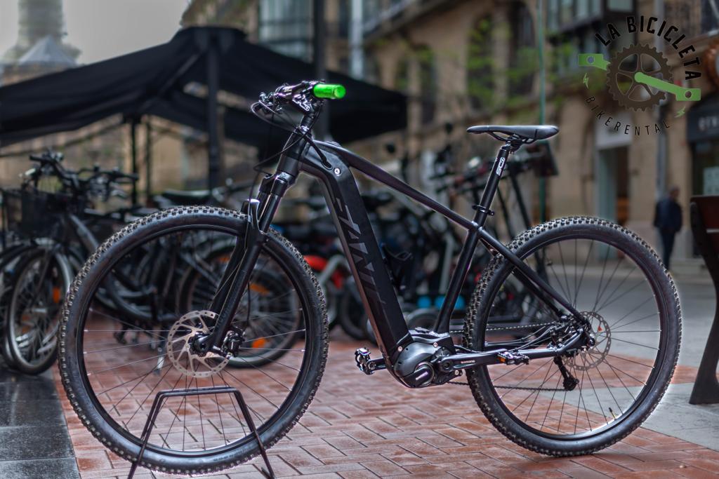 PHOTO-2019-05-24-20-25-36 a bicycle parked on the side of a building
